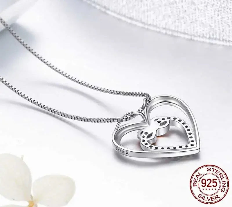 Entwined Hearts: Sterling Silver Infinity Necklace With Double Hearts