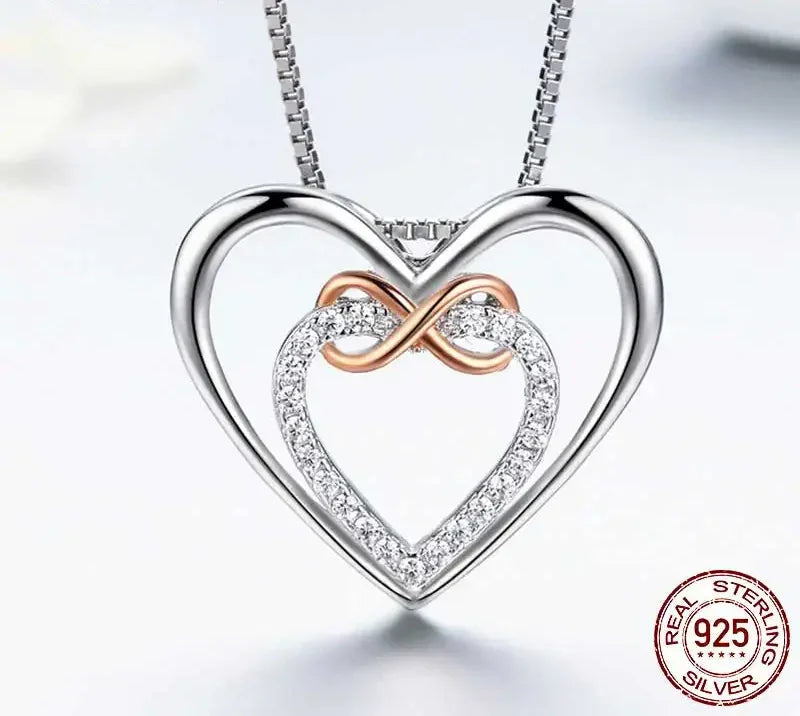 Entwined Hearts: Sterling Silver Infinity Necklace With Double Hearts