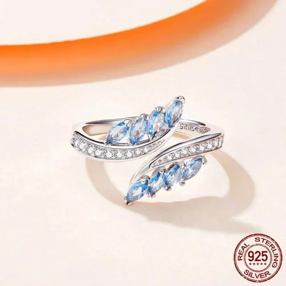 Adjustable Sterling Silver Willow Ring With Light Blue Cubic Zirconia
