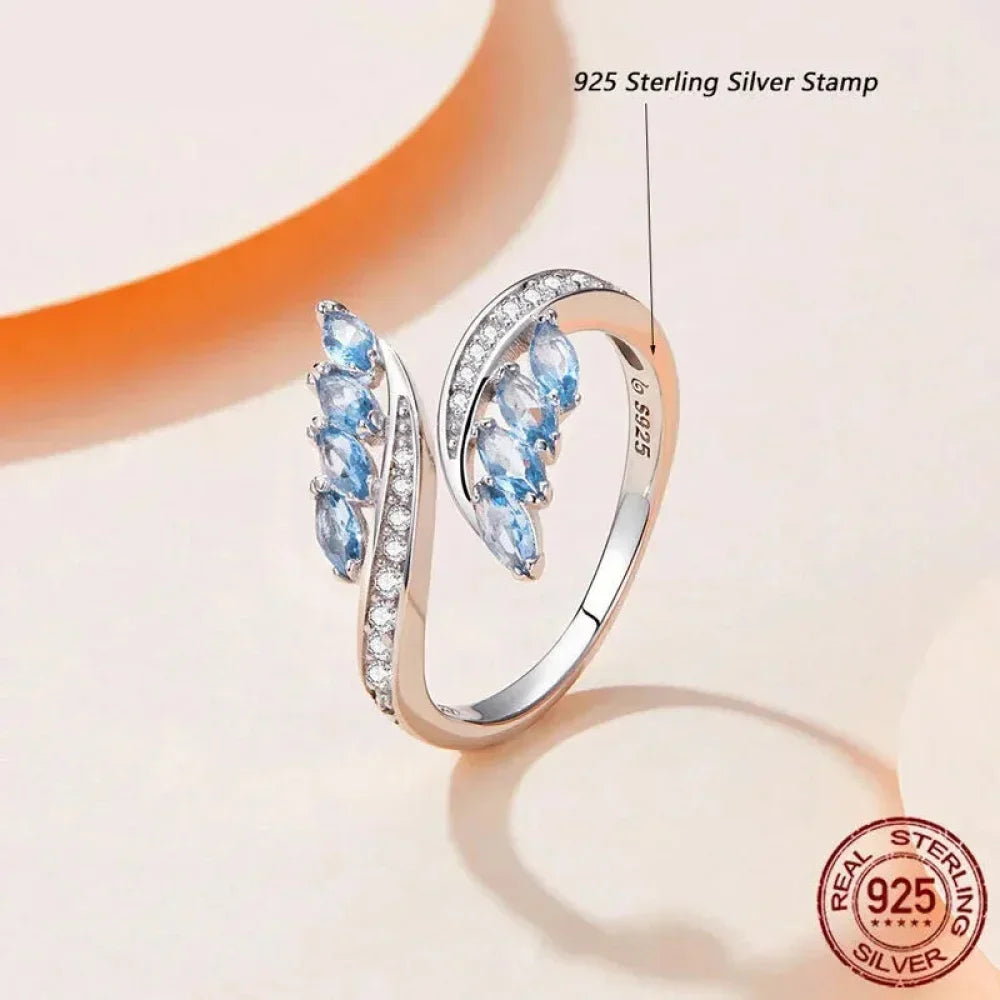 Adjustable Sterling Silver Willow Ring With Light Blue Cubic Zirconia