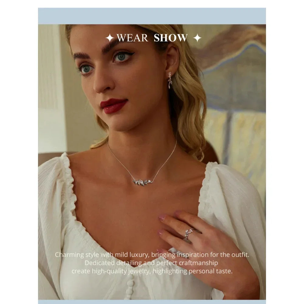 Nature'S Embrace - Sterling Silver Double Leaf Ring With Sparkling Zirconia