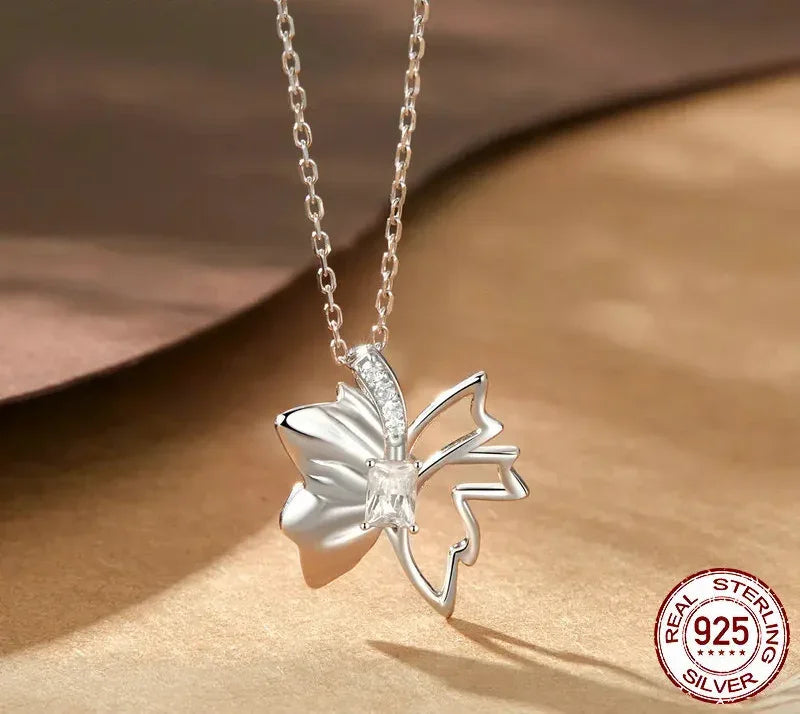 Autumn Elegance: White Gold Plated Sterling Silver Leaf Butterfly Necklace